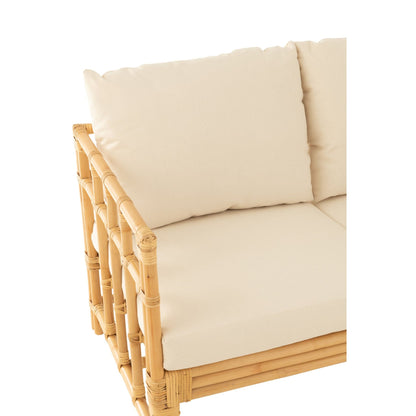 Rotan bank met witte kussens van J-Line als sfeerbeeld